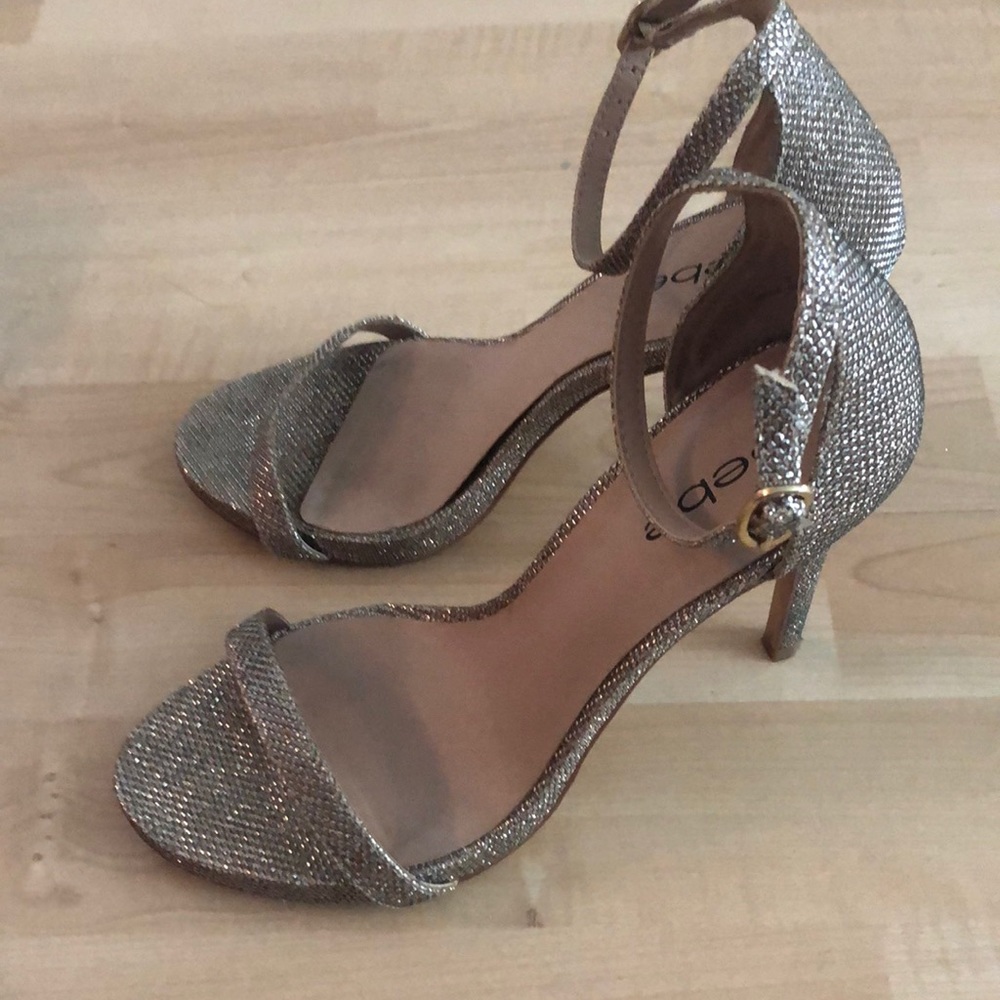 Gold high heels